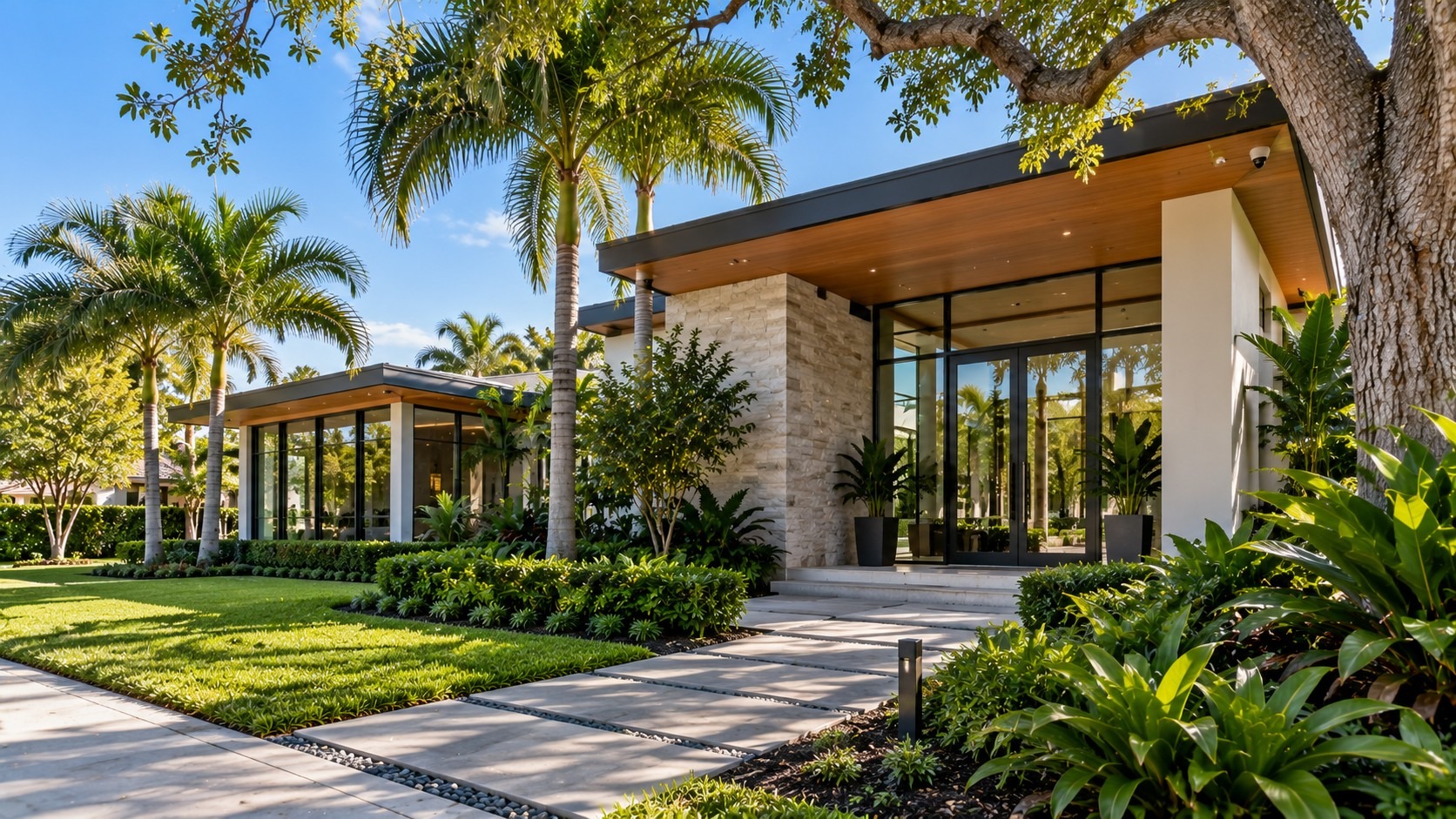 Modern South Florida commercial entrance with landscaping